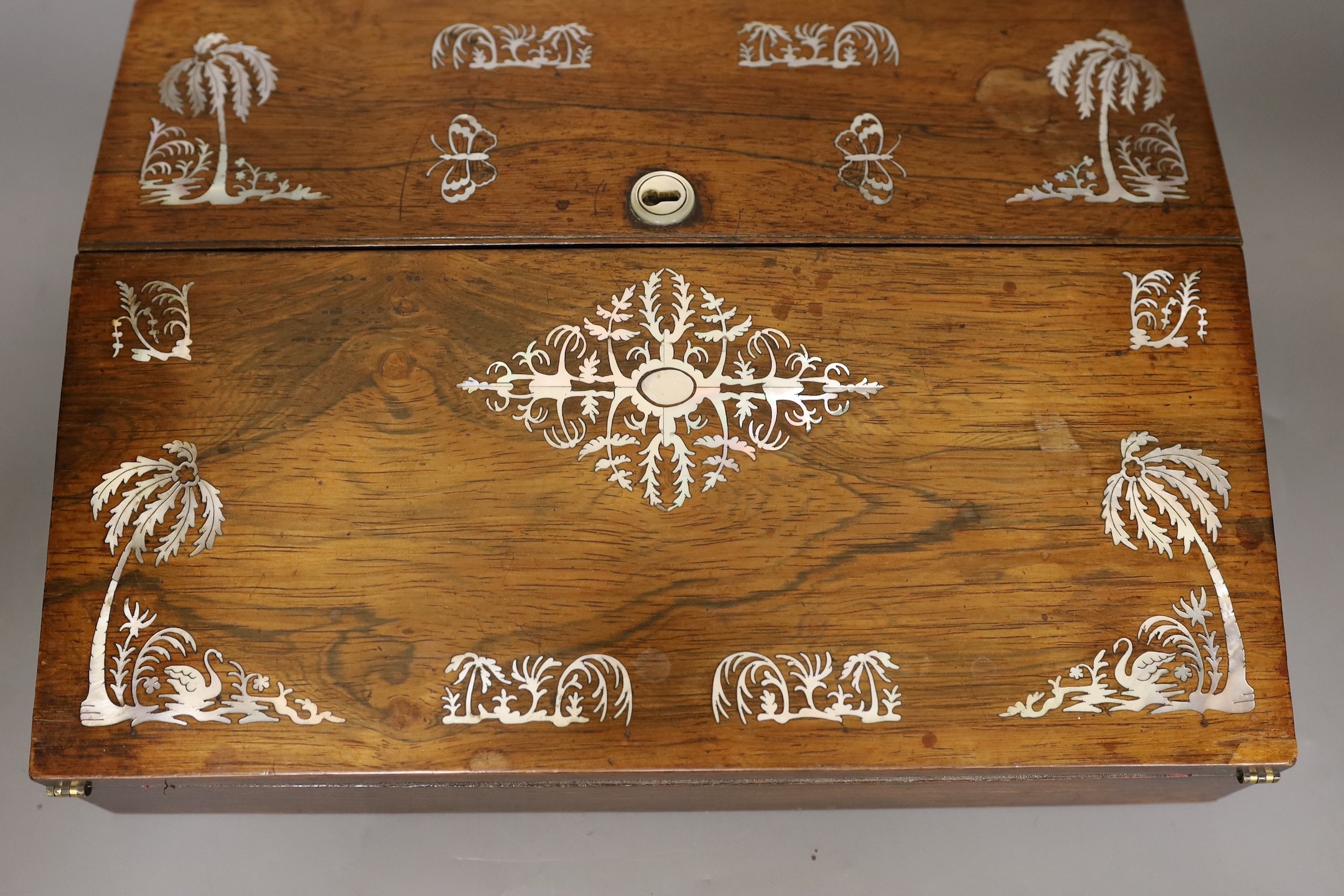 A 19th century rosewood veneered, mother of pearl inlaid writing slope, 35cms wide x 26cms deep